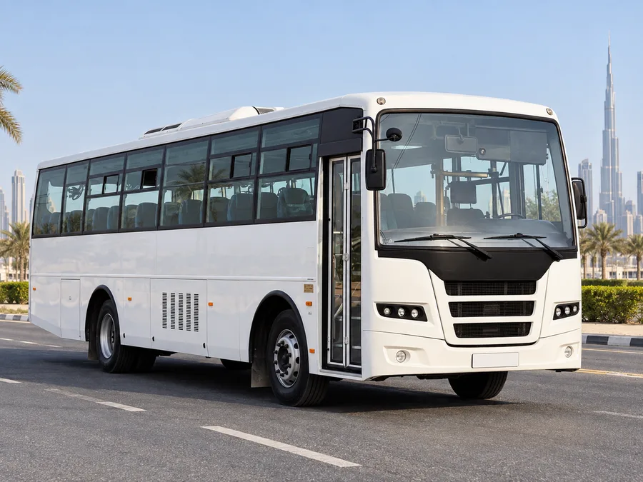 Ashok Leyland 60–67 seater staff bus rental Dubai — front three-quarter view