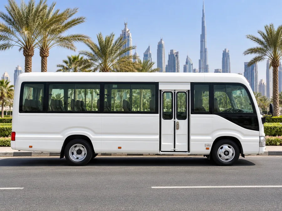 Toyota Coaster passenger minibus side profile from Royal Dream fleet gallery