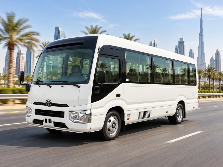 Toyota Coaster representing shuttle bus rental and repeated loop transport Dubai